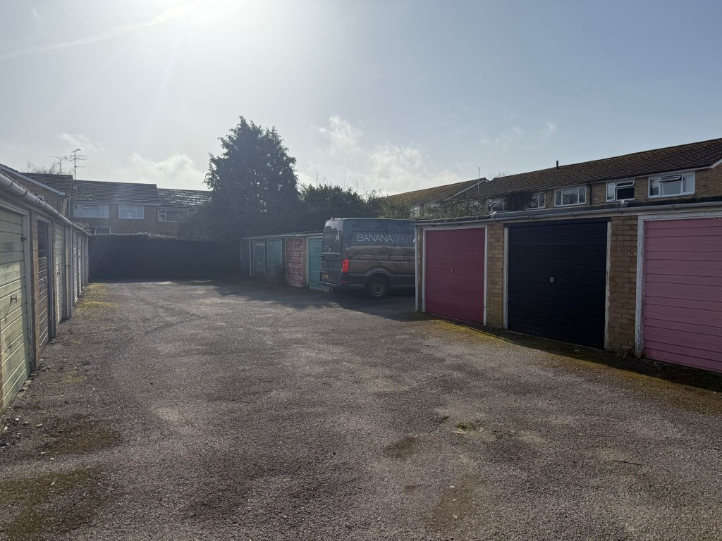 Lot: 17 - FREEHOLD GROUND RENT INVESTMENT - View of Verney Close garages and driveway